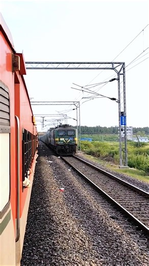 Express train crossing cargo on track 🙂 #cargo #goodstrain #railway #transport #shyam_hembram
