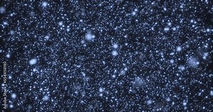 Many blue particles moving through space. Bokeh. Slow motion of snowflakes in a vortex of wind. Stock Video