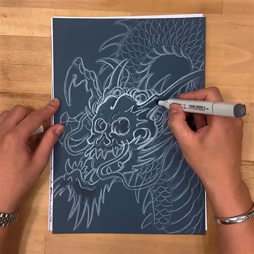 Tạ Duy Thành on Instagram: "Humanoid Skull Dragon | Japanese Traditional Tattoo Drawing 💀🐉 Let’s step into the uncanny valley 😂 This design mixes a humanoid skull with a dragon, by using with Japanese traditional elements. The skull is drawn using the same process as in my previous skull tutorials. I start with simple construction shapes, using circles and planes to block in the head and facial structure. A clear centerline helps place the eye sockets and keep the proportions balanced. The ti