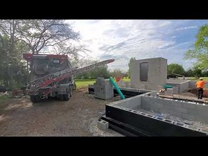 #6 Rock Slinger Truck Filling Concrete Safe Room and Foundation with gravel Goddard Family Farmhouse