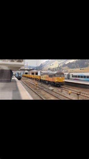 56049 cruises through Colwick Park station heading back home from a weekends engineering. #oogauge #ColwickParkTMD #weathered #modelrailway #modelrailwaysuk #modelrail #modeltrains #modelbahn #modelrailways #scalemodel #scalemodelling #railway #train #trains #station #trainspotting #modeltrainstagram #railwayphotography #modelrailroad #railwayphotograph #freight #modelrailroading #railwaymodelling #modelrailwayscene #locomotive #ukrailscene #ratcliffepowerstation #cavalexmodels #modernimage #rai