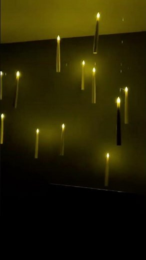 Easy to install budget-friendly Halloween decor: Flameless floating candles with magic wand remote