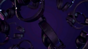 Headphone animation with alpha channel Video loops. Rotating Headphones. Headphones animation with graphic Equalizer in the Background, and glowing Sound Wave.