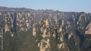 Explore Zhangjiajie Wulingyuan Scenic Area's unique landforms and breathtaking aerial views of strange mountains