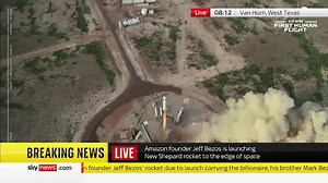 Jeff Bezos and crew make safe landing as billionaire achieves childhood dream of becoming astronaut