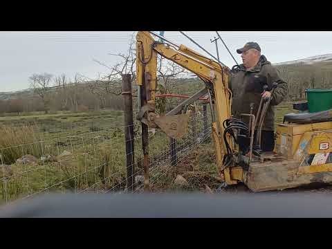 Finally unleashing the homemade cheaply knocked together mini digger post knocker