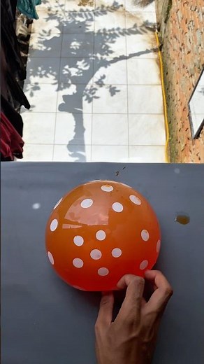 Experiment: Dropping colored water balloons from a height—will they burst?