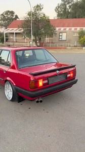 Red hot and ready to roll! 🔥 This E30 is the perfect blend of power and passion., Rich gusheshe all the way🇿🇦😩/ Don't forget to follow @gusheshe_strictlygerman to view South Africa's gush community #Gusheshe_strictlygerman #stance #stanceisnotacrime #325i #german #powerpipe #Gusheshe #beamer #mzansirides #lowlife | SpinTalks