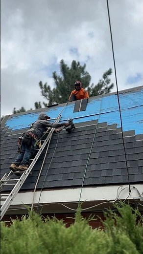 This is how roofers install shingles on roofs too steep to walk on! 🏡 #roofing #construction