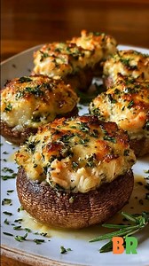 Lobster-Stuffed Mushrooms with Garlic Herb Butter 🍄🦞 Tender mushroom caps are filled with a luxurious lobster and cheese mixture, then baked until bubbling and finished with fragrant garlic herb butter. This preparation highlights gentle handling of lobster and controlled baking to achieve richness without heaviness. 🛒Ingredients : For the Mushrooms: 12 large button or cremini mushrooms, stems removed 1 tablespoon olive oil salt and black pepper, to taste For the Filling: 1 cup cooked lobster