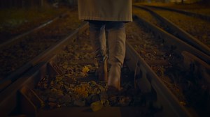 Professional Female Photographer Using DSLR Camera Capturing Photos