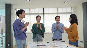 Business developer team creative asian in application development presentation meeting, mobile app software design project clap your hands to show the success of the project