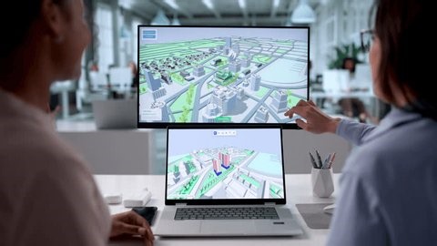 clip-4012962585-engineers-designing-construction-project-using-software-gis