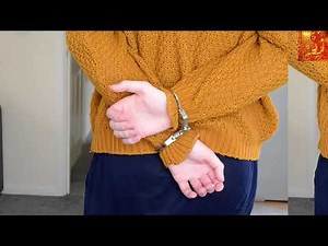 Beautiful girl arrested and handcuffed behind her back