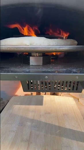 Wood-Fired flavor meets modern firepower. Bertello SimulFIRE 16" Rotating Outdoor Pizza Oven