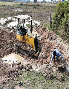 27K views · 287 reactions | Precision Push! Bulldozer Clears Every Inch of Truck Load | Dozer Tv | Facebook