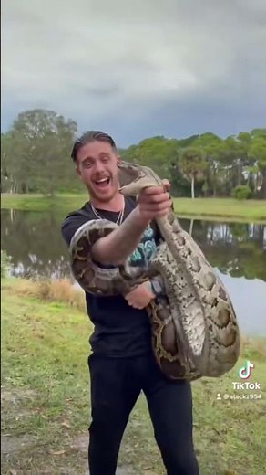 Wild 10 Foot Burmese Python Tried Biting Us Multiple Times!