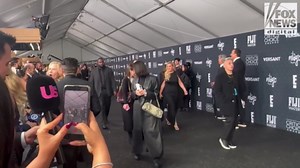 Jessica Biel walks the red carpet at the Critics Choice Awards