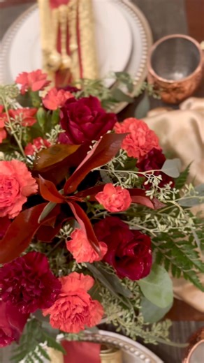 With fiery coral carnations and velvety red roses, the Vivian embodies warmth, charm, and classic autumn richness. A centerpiece full of color and movement, she instantly becomes the focal point of your holiday gathering. $40 pickup Tuesday | White Barn Floral Design