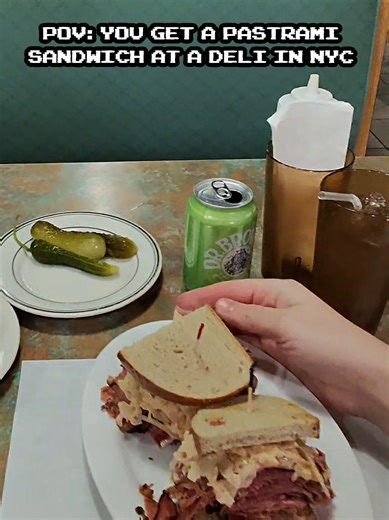 Enjoying Pastrami Reuben Sandwich in NYC