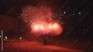 fireshow. dances with fire and fireworks. fire performance