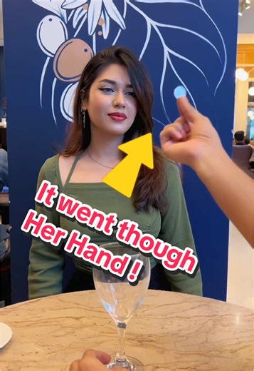 Did you see when the coin went through her hand? #magic #fyp