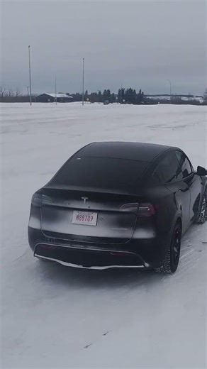 tesla model y performance, tesla model y tested in deep snow, tesla model y snow, snow tesla model y