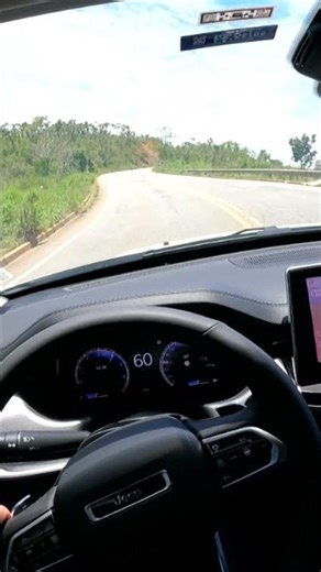 Jeep Compass overtaking on the highway.
