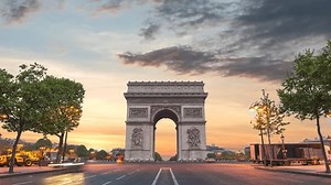 Paris France time lapse, sunrise city skyline at Arc de Triomphe and Champs Elysees