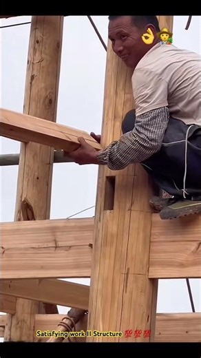 Building a traditional wooden house by hand