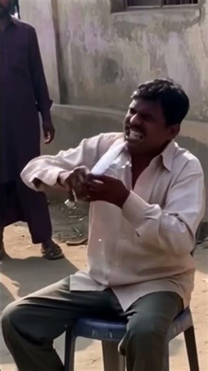 Indian Hindi eating long halogen lamp bulb