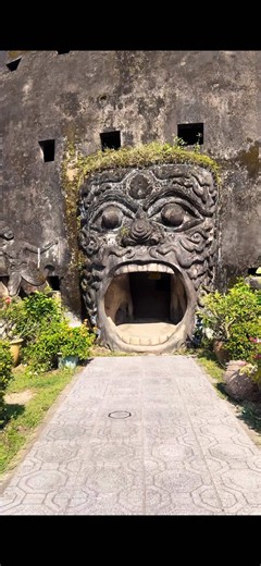 Located just outside Vientiane, the capital of Laos, Buddha Park, also known as Xieng Khuan, is a surreal sculpture park featuring more than 200 statues inspired by Buddhist and Hindu mythology. Created in 1958 by the mystic Luang Pu Bunleua Sulilat, the park is home to enormous concrete sculptures of gods, demons, mythical creatures and Buddhas. One of its most unusual structures is a giant pumpkin shaped building representing Hell, Earth and Heaven, which visitors can explore by climbing throu