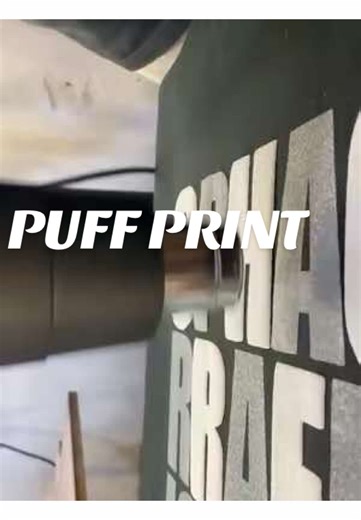 Watch the magic of puff printing in action! From screen to cotton, we elevate your designs with texture and style on heavy-duty t-shirts. Let’s bring your custom creations to life with precision and care. Ready to make your brand stand out? #PuffPrinting #ScreenPrinting #CustomTShirts #ElevatedDesigns #ThreadingDetails #ProfessionalPrinting #BoldAndTextured #printlife