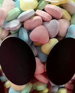 Guess how many candy hearts! 💜💛🧡🤍 Our guess the number of candies in the jar game is here. We have the jar in the lobby of our adoption center. Come by and submit your guess(es) and enter to win a $50 Target gift card and $50 Movie Tavern gift card. Visit www.heritagehumane.org/hearts to learn more about our Hearts for Homeless Pets fundraiser going on now. All proceeds benefit HHS! #heartsforhomelesspets | Heritage Humane Society