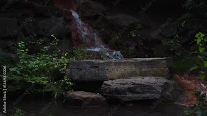 Waterfall in the park in summer. Keeley Falls in Andrew Haydon Park in Ottawa, Canada