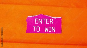 Enter to win message writing on ripped pink torn paper piece on orange background. Conceptual enter to win symbol.