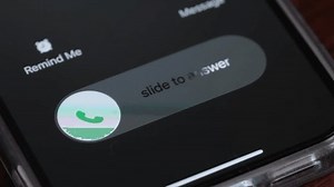 clip-1105963505-macro-video-incoming-call-on-mobile-phone