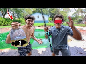 1v1 WHO CAN GET THE BIGGEST FISH FOR THE BACKYARD POND!!! (Blindfolded)