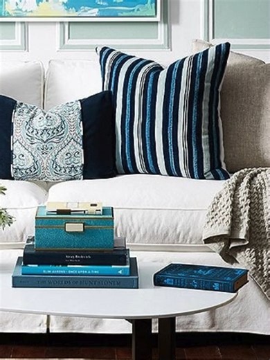 www.hotinteriordecor.com Coastal Living Room Decor Ideas That Feel Fresh and Elegant Save this blue and white living room inspiration for a fresh, modern, and coastal aesthetic. This space combines neutral furniture with bold blue throw pillows, layered textures, and clean styling to create a balanced and elegant look. Perfect for anyone looking for living room decor ideas, coastal home inspiration, or ways to add color to a neutral space without overwhelming it. #livingroomdecor #coastalhomedec