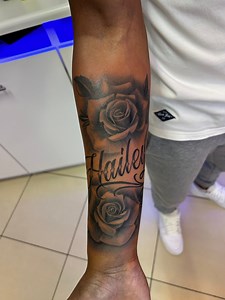 11K views · 75 reactions | Shout out to Hailey! If she hadn’t been born, we wouldn’t have met these amazing people. Many blessings to you all and your beautiful baby girl!  #grateful #blessings #familylove #rosetattoo #blackandgreytattoo #blakeinktattoos #tattooartist #capetownsouthafrica #fyp @top fans | Blake Ink Tattoo & Piercing Studio | Facebook