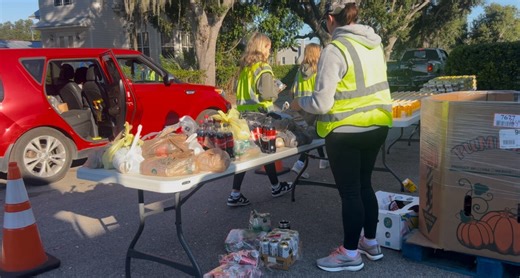 Parrish United Methodist Church serving dozens of families with a drive-through food pantry distribution