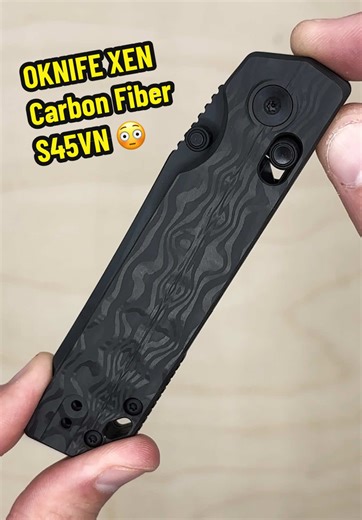 The OKNIFE XEN pocket knife now available with CPM-S45VN blade steel and carbon fiber handles. Designed by Ken Onion, the XEN features a smooth crossbar lock, reversible deep carry pocket clip, and beautiful damascus patterned carbon fiber handle scales. A great premium EDC knife. @OKNIFE DIRECT #pocketknife #everydaycarry #foldingknife #edcknife #oknife