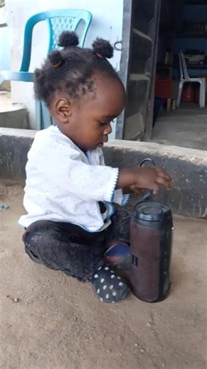 Cute Baby Playing with an MP3 Player #nurseryrhymes #kidsapp #toddlergirl #kidstab #messengerkids