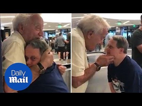 Beautiful moment dad has emotional reunion with down's syndrome son