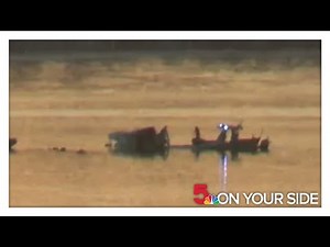 Raw video: American Airlines flight 5342 midair crash scene
