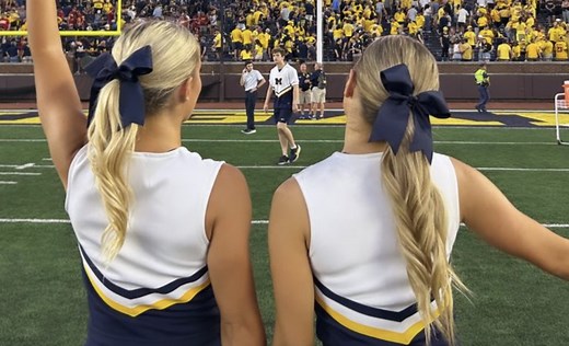 'Stunning' Michigan Cheerleader Goes Viral After Huge Road Victory