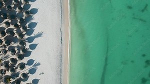 Aerial from Eagle beach on Aruba in the Caribbean, bird ey view at the beach with umbrella at Aruba Eagle beach with blue ocean