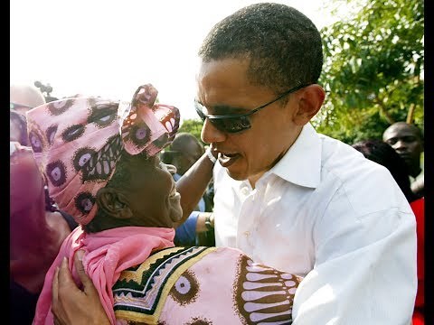 Former President Barack Obama dances with Mama Sarah Obama