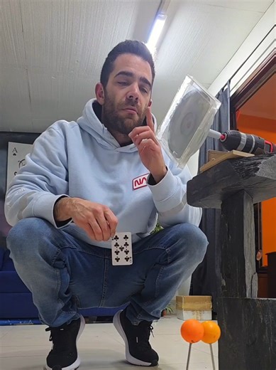 Mastering Trick Shots: Cardthrowing into Spinning CD Case