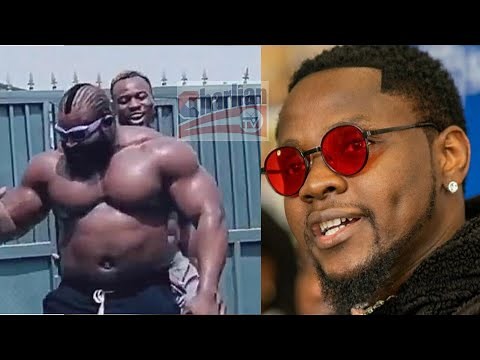 Meet Singer Kizz Daniel Body Guard - He Is The Strongest Bouncer In Nigerian Music Industry